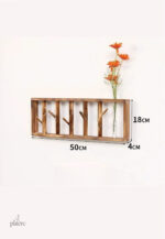 Porte manteau mural en bois foncé design floral